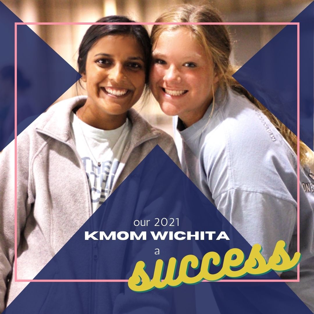 2021 KMOM Wichita a Success. Two volunteers smiling.